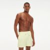 Tommy Hilfiger pánské šortky UM0UM01080-701 žluté