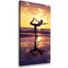 Vertikálny foto obraz na plátne Joga na pláži 50x100 cm Vertikálny foto obraz na plátne Joga na pláži 50x100 cm