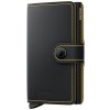 Kožené pouzdro na karty SECRID Miniwallet Matte Black Ochre černá se žlutým prošíváním Kožené pouzdro na karty SECRID Miniwallet Matte Black Ochre černá se žlutým prošíváním
