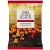 Tesco Pražené lúpané arašidy obalené v cestíčku s príchuťou čili 200 g Tesco Pražené lúpané arašidy obalené v cestíčku s príchuťou čili 200 g