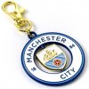 Prívesok na kľúče a batoh s logem fotbalového klubu Manchester City