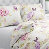 Biante Bavlnené posteľné obliečky Sandra SA-532 Fialové kvety s motýlikmi na svetlo krémovom Predĺžené 140x220 a 70x90 cm Biante Bavlnené posteľné obliečky Sandra SA-532 Fialové kvety s motýlikmi na svetlo krémovom Predĺžené 140x220 a 70x90 cm