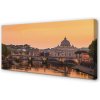 Obraz na plátne rieka Rím Sunset mosty budovy 100x50 cm Obraz na plátne rieka Rím Sunset mosty budovy 100x50 cm