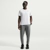 Pánske športové tepláky Nike M NK DF CHALLENGR WVN PANT sivé FQ4780-084 - S Pánske športové tepláky Nike M NK DF CHALLENGR WVN PANT sivé FQ4780-084 - S