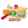Bigjigs Toys Súprava drevených potravín syry na doske Bigjigs Toys Súprava drevených potravín syry na doske