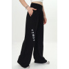 Fashionkids Dievčenské voľné nohavice s nápisom a širokým pásom – čierne Farba: Čierna, Veľkosť: 176 Fashionkids Dievčenské voľné nohavice s nápisom a širokým pásom – čierne Farba: Čierna, Veľkosť: 176