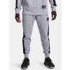 Under Armour Pánske tepláky UA BASELINE FLEECE JOGGER Šedá MD Under Armour Pánske tepláky UA BASELINE FLEECE JOGGER Šedá MD