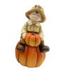 Keramická záhradná dekorácia chlapčeka v žltom kabátiku a klobúku sediaceho na tekvici 22 x 21 x 37,5 cm 40000 Keramická záhradná dekorácia chlapčeka v žltom kabátiku a klobúku sediaceho na tekvici 22 x 21 x 37,5 cm 40000