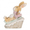 Clayre & Eef Zimná dekorácia králiček v čepke na saniach - 8*6*9 cm - Clayre & Eef Clayre & Eef Zimná dekorácia králiček v čepke na saniach - 8*6*9 cm - Clayre & Eef