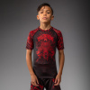 Detské tričko s krátkym rukávom VENUM Wolf Atak Rashguard – čierne/červené Detské tričko s krátkym rukávom VENUM Wolf Atak Rashguard – čierne/červené