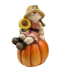 Keramická záhradná dekorácia dievčatka v oranžových šatočkách a klobúku sediacej na tekvici 22 x 21 x 37,5 cm 40807 Keramická záhradná dekorácia dievčatka v oranžových šatočkách a klobúku sediacej na tekvici 22 x 21 x 37,5 cm 40807