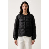 Calvin Klein Jeans prešívaná bunda dámska LV047G510G čierna XS Calvin Klein Jeans prešívaná bunda dámska LV047G510G čierna XS