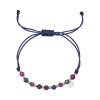 PAVONA Textilný náramok fialový s korálkami ruby a natural sapphire 13059.3 PAVONA Textilný náramok fialový s korálkami ruby a natural sapphire 13059.3