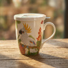 Hrnček s viečkom a sitkom BONE CHINA 450 ml vzor papagáj Hrnček s viečkom a sitkom BONE CHINA 450 ml vzor papagáj