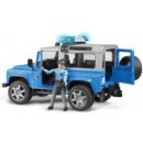 Bruder 2597 Policejní Land Rover Defender + policista a maják