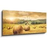 Obraz s hodinami 1D panorama - 120 x 50 cm - Field of freshly bales of hay with beautiful sunset Pole čerstvých balíků sena s krásným západem slunce – Sleviste.cz