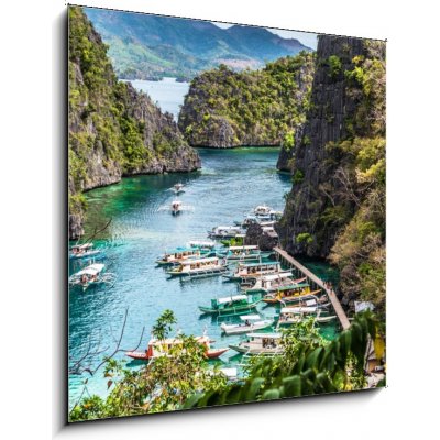 Skleněný obraz 1D - 50 x 50 cm - Boats near the shore, Busuanga, Coron, Philippines. With selective focus. Lodě poblíž pobřeží, Busuanga, Coron, Filipíny. Se selektivním – Hledejceny.cz