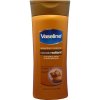 Tělová mléka Vaseline Essential Moisture Cocoa Radiant tělové mléko 400 ml