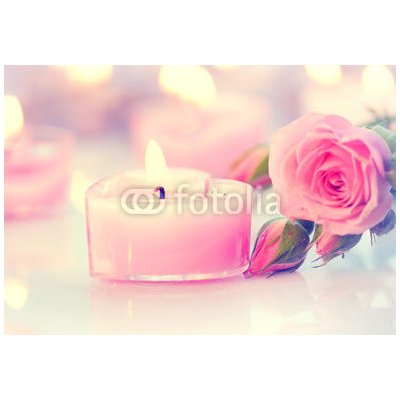 WEBLUX 76560272 Fototapeta vliesová Valentine&apos;s Day. Pink heart shaped candles and rose flowers Valentýn. Svíčky ve tvaru růžového srdce a růžové květy rozměry 145 x 100 cm