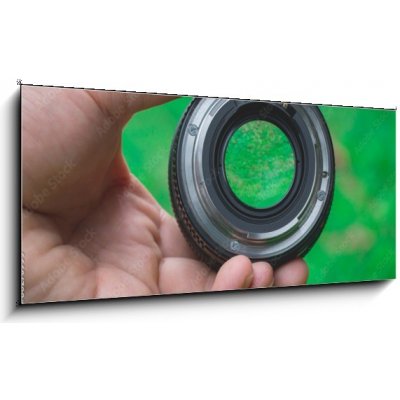 Obraz 1D panorama - 120 x 50 cm - Mobile lenses on a green lawn. Mobilní čočky na zeleném trávníku. – Zboží Mobilmania