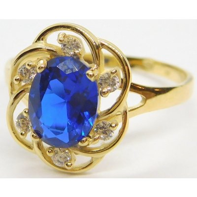 Klenoty Budín Mohutný zlatý prsten s velkým s modrým safírem HK1083