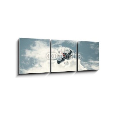 Obraz s hodinami 3D třídílný - 150 x 50 cm - Fighter plane on cloudy sky Bojové letadlo na zatažené obloze – Zbozi.Blesk.cz
