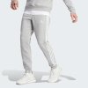 Pánské tepláky adidas Essentials Fleece 3-Stripes Tapered Cuff