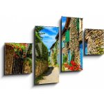 Obraz 4D čtyřdílný - 100 x 60 cm - Beautiful colorful medieval alley in Yvoire town in France Krásná barevná středověká ulička ve městě Yvoire ve Francii – Sleviste.cz