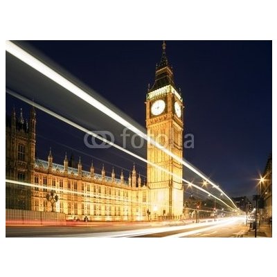 WEBLUX 4170127 Fototapeta plátno Big Ben in London at night against blue sky. London traffic Big Ben v noci v Londýně proti modré obloze. Londýnský provoz rozměry 330 x 244 cm – Hledejceny.cz