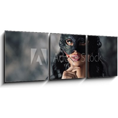 Obraz s hodinami 3D třídílný - 150 x 50 cm - portrait of sexy beautiful woman in lace black erotic lingerie and carnival mask on dark background portrét sexy krásná žena