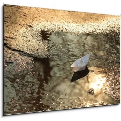 Obraz 1D - 100 x 70 cm - paper ship floats in a spring pool papírová loď pluje v jarním bazénu – Zbozi.Blesk.cz
