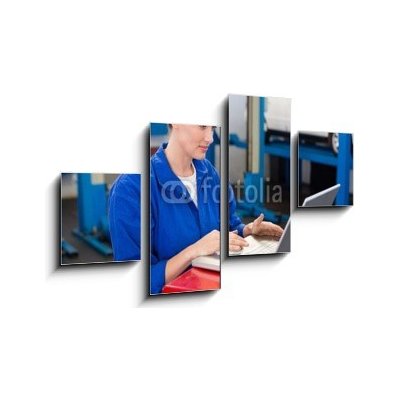 Obraz 4D čtyřdílný - 100 x 60 cm - Mechanic working on a laptop Mechanik pracující na přenosném počítači – Zbozi.Blesk.cz