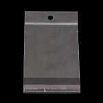 Celofánové sáčky s lepící klopou a otvorem na zavěšení - transparentní - 12 x 8 cm - 100 ks – Sleviste.cz