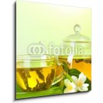 Skleněný obraz 1D - 50 x 50 cm - tea with jasmine in cup and teapot on table on green background čaj s jasmínem v šálku a čajová konvice na stole na zeleném pozadí – Sleviste.cz