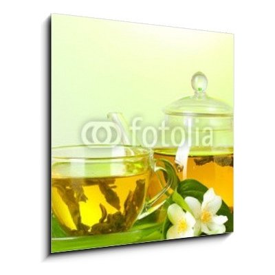 Skleněný obraz 1D - 50 x 50 cm - tea with jasmine in cup and teapot on table on green background čaj s jasmínem v šálku a čajová konvice na stole na zeleném pozadí – Zbozi.Blesk.cz