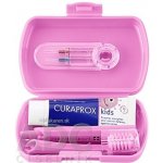 CURAPROX Kids travel set růžový 1x zubní kartáček, 2x mezizubní kartáček CPS, 1x zubní pasta meloun 6+ 10 ml, 1x nálepka – Sleviste.cz