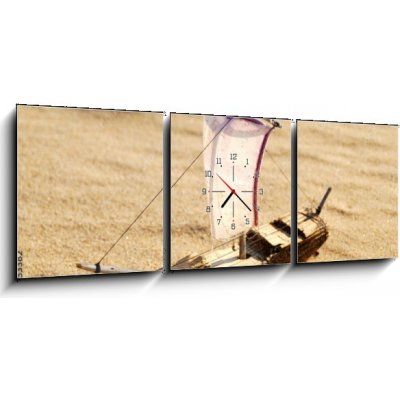 Obraz s hodinami 3D třídílný - 150 x 50 cm - wooden sail ship toy model in the sea sand dřevěná plachetnice model hračky v mořském písku