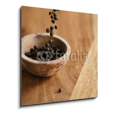 Obraz 1D - 50 x 50 cm - black dry pepper fall into wooden bowl on table Černý suchý pepř spadl do dřevěné misky na stole – Hledejceny.cz