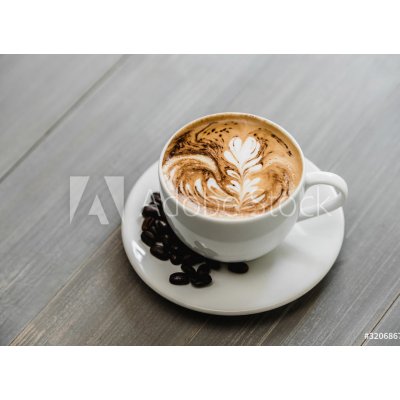 WEBLUX 320686754 Samolepka fólie Fresh brewed coffee with fern pattern latte art in white cup Čerstvě uvařená káva s kapradinovým vzorem latte art v bílém šálku, rozměry 100 x 73 cm