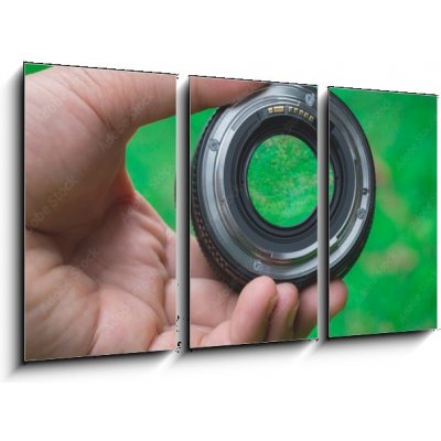 Obraz 3D třídílný - 90 x 50 cm - Mobile lenses on a green lawn. Mobilní čočky na zeleném trávníku. – Zboží Mobilmania