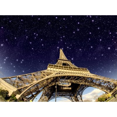 WEBLUX 41726056 Fototapeta vliesová Stars and Night Sky above Eiffel Tower in Paris Hvězdy a noční obloha nad Eiffelovou věží v Paříži rozměry 270 x 200 cm – Zboží Mobilmania