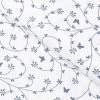 Metráž Goldea bavlněné plátno - modrošedé kytičky a motýlci na bílém 145 cm