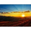 Tapety WEBLUX Fototapeta vliesová Beautiful sun set with sweet clouds between mountains - 569569643 200 x 144 cm