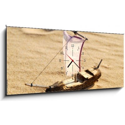Obraz s hodinami 1D panorama - 120 x 50 cm - wooden sail ship toy model in the sea sand dřevěná plachetnice model hračky v mořském písku