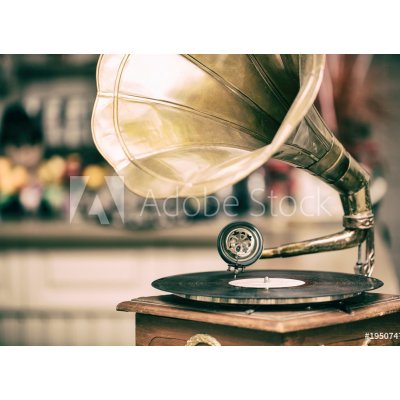 WEBLUX 195074759 Fototapeta vliesová Retro old gramophone radio. Vintage style toned photo Retro staré gramofonové rádio. Fotografie ve stylu vintage stylu rozměry 100 x 73 cm – Zbozi.Blesk.cz