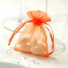 Svatební cukrovinka Sáček z organzy oranžový 10 ks - organzový pytlíček na svatební mandle a dárečky pro hosty
