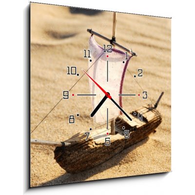Obraz s hodinami 1D - 50 x 50 cm - wooden sail ship toy model in the sea sand dřevěná plachetnice model hračky v mořském písku