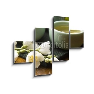 Obraz 4D čtyřdílný - 120 x 90 cm - Green tea with jasmine in cup and teapot on wooden table Zelený čaj s jasmínem v šálku a konvici na dřevěném stole – Zbozi.Blesk.cz