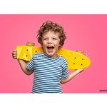 WEBLUX 245786759 Fototapeta vliesová Happy curly boy laughing and holding skateboard Šťastný kudrnatý chlapec se směje a drží skateboard rozměry 270 x 200 cm – Zboží Mobilmania