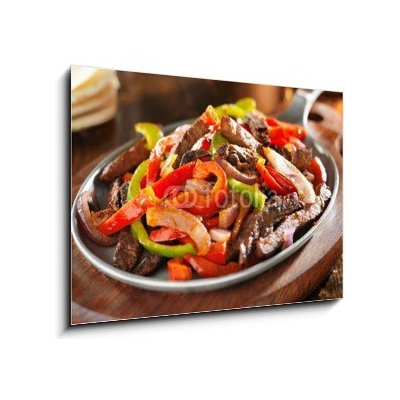 Obraz 1D - 100 x 70 cm - mexican food - beef fajitas and bell peppers mexické jídlo